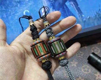 Perlina in paracord di titanio fosforescente, perlina in rame per cordino coltello, giocattolo antistress EDC, tirazip tattico, regalo personalizzato per uomo con equipaggiamento EDC