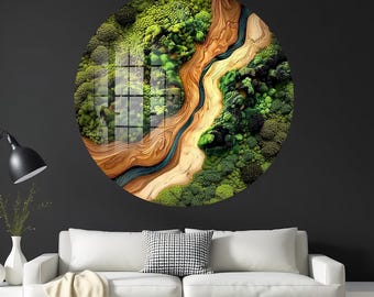 May include: A round wall art piece depicting a detailed aerial view of a landscape. The artwork features a river winding through a forest with shades of green, brown, and blue. The piece is mounted on a dark wall above a white sofa.