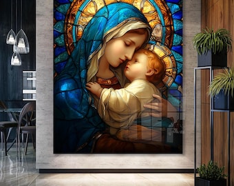 May include: A stained glass artwork showing a mother and child. The mother is wearing a blue veil and holding the child, who has red hair. The background has a colourful stained glass design with blue, gold, and brown tones. The artwork is displayed on a wall.