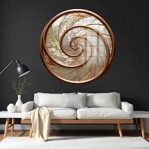 May include: A large, round wall art piece with a spiral design. The artwork features a gold-colored frame and a pearlescent, shell-like interior. The spiral design is a prominent feature, creating a sense of movement and depth. The artwork is mounted on a dark gray wall.