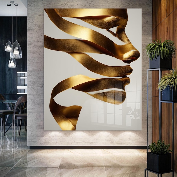 Arte de parede em vidro com perfil de rosto dourado: decoração moderna para casa