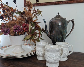 Vtg Cream White Flower and Fruit Embossed Mugs