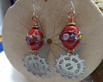 Geared up steampunk orange lampwork dangle earrings