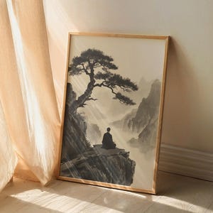 Framed Zen Buddha Bodhi Tree print with a meditating silhouette on misty rocky cliffs; moody vintage Chinese Buddhist artwork.