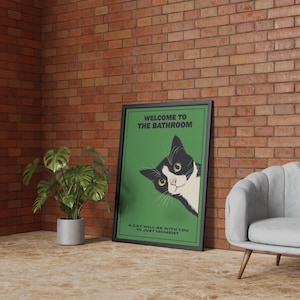 Funny tuxedo cat bathroom print — green framed decorative poster with a black-and-white cat; perfect restroom wall art for cat lovers.