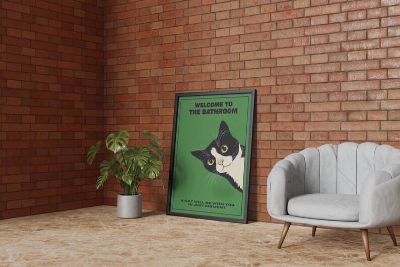 Funny tuxedo cat bathroom print — green framed decorative poster with a black-and-white cat; perfect restroom wall art for cat lovers.