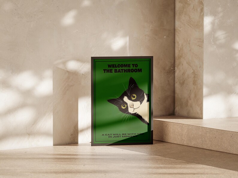 Funny tuxedo cat bathroom print — green framed decorative poster with a black-and-white cat; perfect restroom wall art for cat lovers.