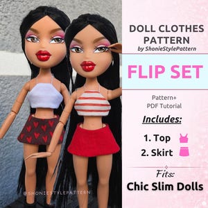 May include: Two dolls with long black hair and red lips wearing doll clothes. One doll wears a white halter top and a brown skirt with red hearts. The other wears a red and white striped halter top and a red skirt. Text reads DOLL CLOTHES PATTERN.