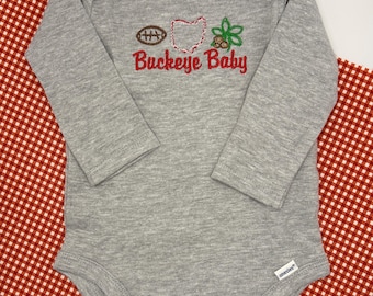 Buckeye Baby Onesie® | Lil’ Buckeye Long Sleeve Gerber Onesie | Ohio Baby Outfit | Baby Shower Gift | Football Baby Bodysuit | Embroidered