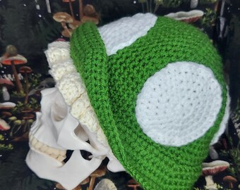Green extra life hand crocheted mushroom cap.