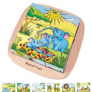 Può includere: Un puzzle di cubo di legno con un'immagine colorata di tre elefanti che giocano in una piscina. Il puzzle è composto da nove cubi più piccoli che possono essere disposti per creare l'immagine. Il puzzle è realizzato da Mascot Toys.