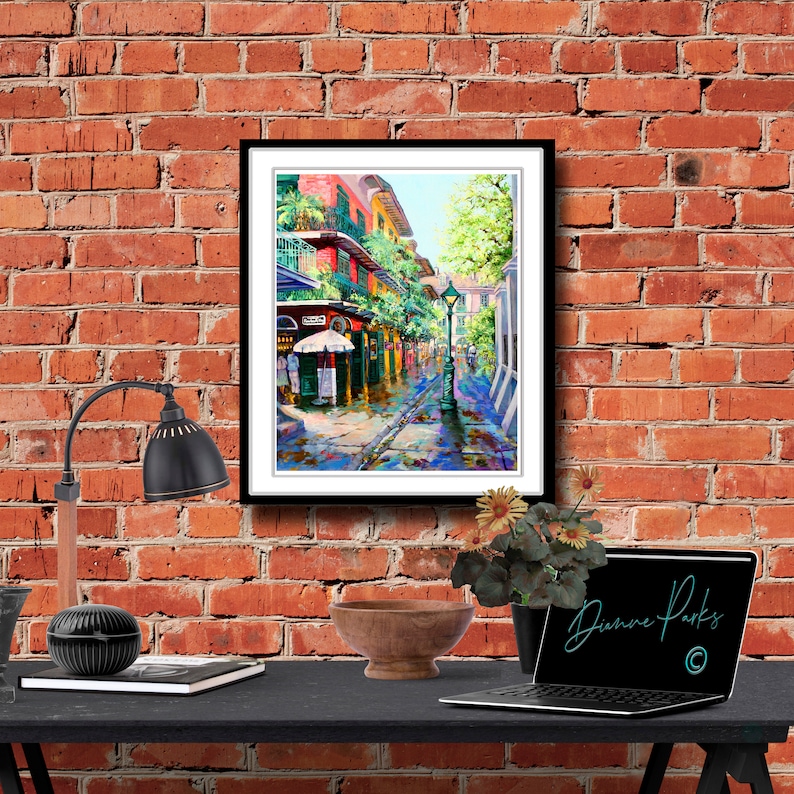 May include: A colorful painting of a street scene in New Orleans, Louisiana. The painting features a narrow street lined with brightly colored buildings, a lamppost, and a few people walking by. The painting is done in a vibrant style with bold colors and brushstrokes.