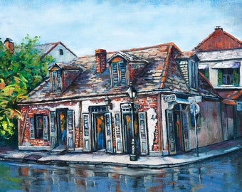 May include: A painting of a brick building with a brown roof and a street sign that reads "Lafitte". The building has several windows and doors with shutters. The building is on a corner lot and there is a street lamp in front of it.