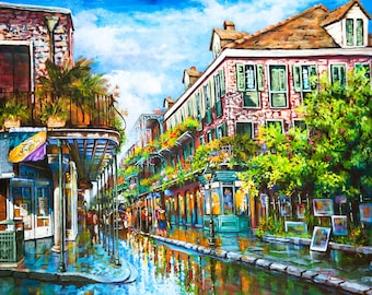 May include: A colorful painting of a street scene in New Orleans, Louisiana. The street is lined with brick buildings with balconies and wrought iron railings. There are trees and flowers in bloom. The street is wet from a recent rain shower, and the buildings are reflected in the puddles.