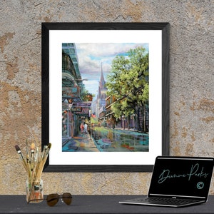 May include: A painting of a street scene in New Orleans, Louisiana. The painting features a narrow street lined with buildings, a large tree, and a church in the distance. The street is wet from recent rain, and there are people walking on the sidewalk.