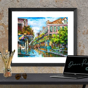 Framed view in a room of French Quarter painting with vibrant colors and bring to life the street scene, reflecting the old-world atmosphere unique to New Orleans.