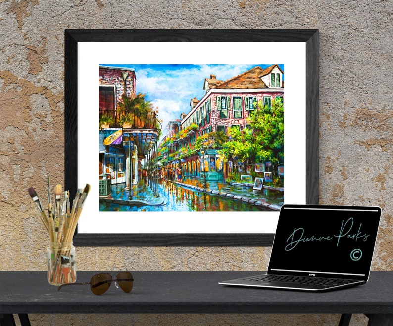 Framed view in a room of French Quarter painting with vibrant colors and bring to life the street scene, reflecting the old-world atmosphere unique to New Orleans.