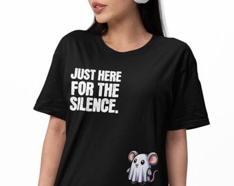 May include: Black t-shirt with the text "JUST HERE FOR THE SILENCE." A cartoon mouse wearing a ghost costume is printed on the lower right. The shirt is made of a soft material.