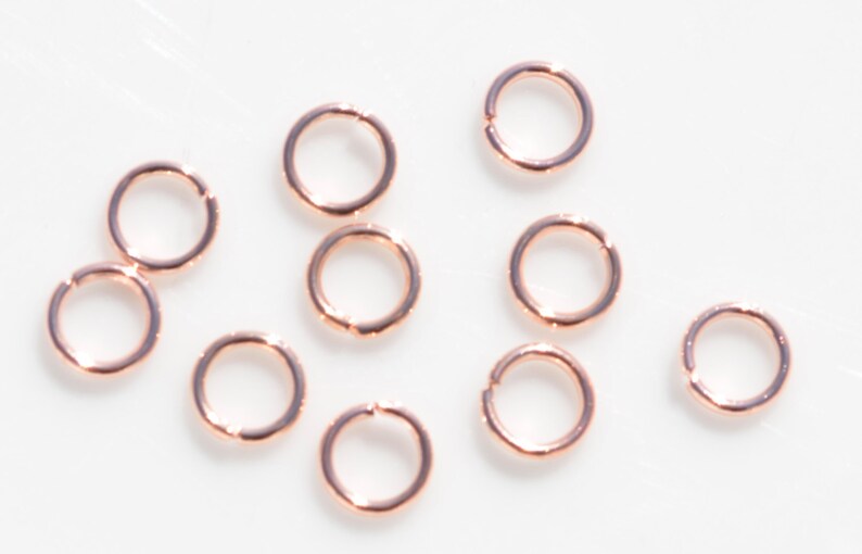 100 Rose Gold Tone 6mm Jump Rings F477