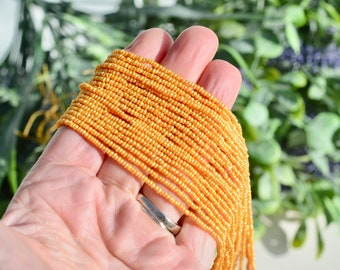 1 Strand Light Orange Cultured Freshwater Seed Pearls BD982