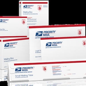 May include: An assortment of white Priority Mail boxes and envelopes, each with red trim and the USPS logo. The packaging displays "Priority Mail" and "Mailing Box". A small mailing tube is also present. Measurements are in centimeters.