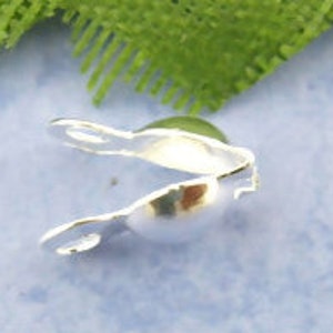 50 Bead Tip Connectors Clam Shell 8 x 4mm Bright Silver  Tone with  two closed loops F500