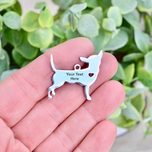 May include: Silver Chihuahua dog charm with a heart cutout and the text "Your Text Here" engraved on the back.