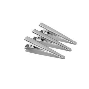 May include: Three silver alligator clips, also known as hair clips, are arranged in a triangular shape on a white background.