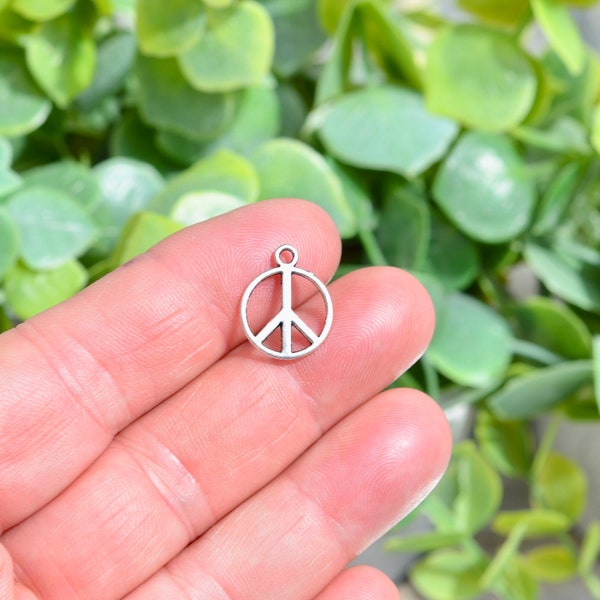 BULK 50 PEACE Silver Tone Charms SC2454