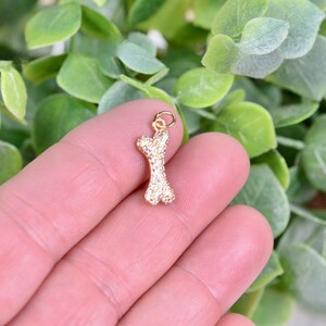 Diamond dog shop bone pendant
