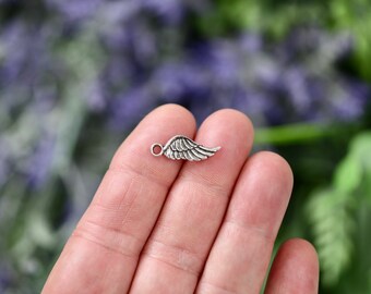 10  Wing Silver Tone Charms SC3906