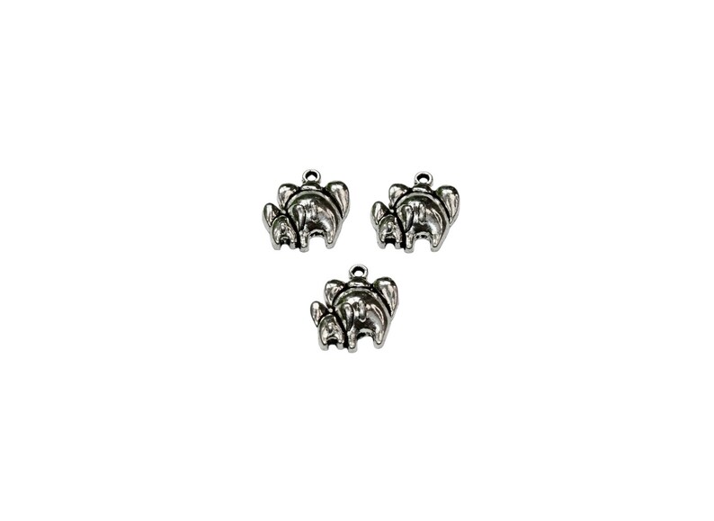 May include: Three silver charm pendants shaped like elephants, each with a smaller elephant standing behind a larger elephant.
