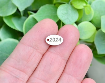 Year 2024, Stainless Steel  Custom Laser Engraved  Oval Charm CC180