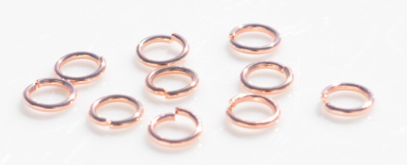100 Rose Gold Tone 6mm Jump Rings F477