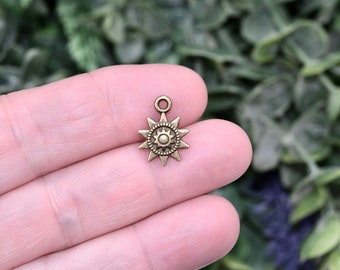 10   Sun Bronze Tone Charms BC5947