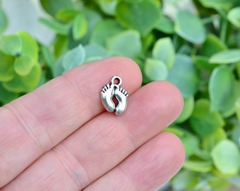 BULK 50 Little Silver Feet Charms SC1891
