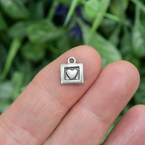 BULK 50    Framed Heart  Silver Tone Charms SC2075
