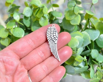 BULK 20  Wing Silver Tone Charms SC6555