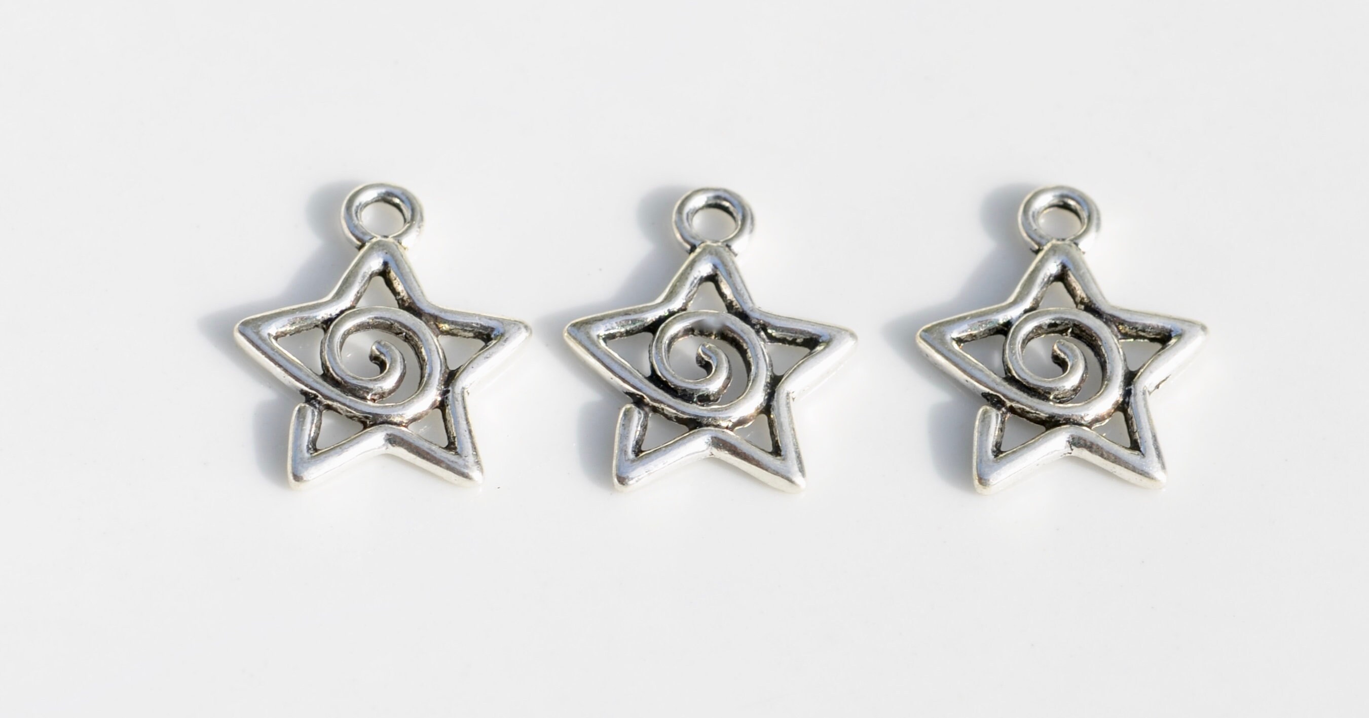 1 Open Star With a Swirl Silver Tone Charm SC6844 - Etsy