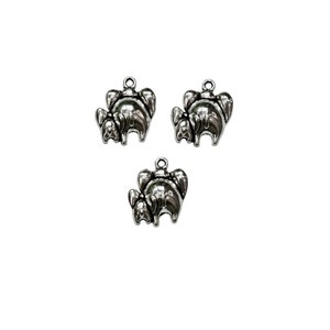 May include: Three silver charm pendants in the shape of elephants. Each elephant is standing with its trunk raised and has a smaller elephant standing behind it.