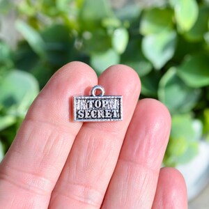 1 Top Secret Silver Tone Word Charm SC6563