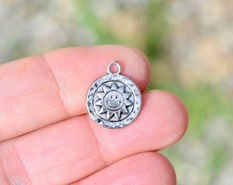 10  Sun Silver Tone Charms SC6548