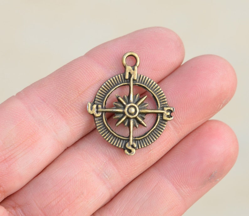 1 Compass Bronze Tone Charm BC6129