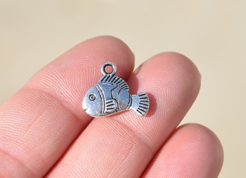 BULK 50 Fish Silver Tone Charms SC2433