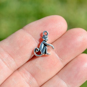 BULK 50 Monkey 3D Silver Tone Charms SC5438