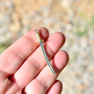 1 Sword Gold Tone Charm GC5634