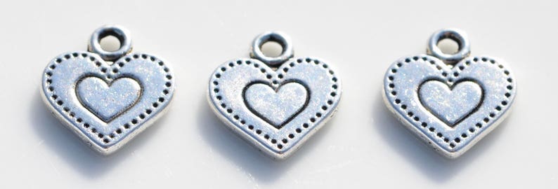 BULK 50 Dotted Heart Antique Silver Tone Charms SC5235