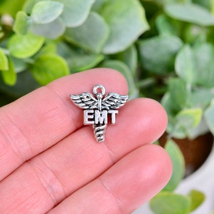 BULK 20 EMT  Silver Tone Charms SC1332