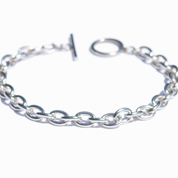 1 Stainless Steel Link 7.5" Charm Bracelet with a Toggle C947