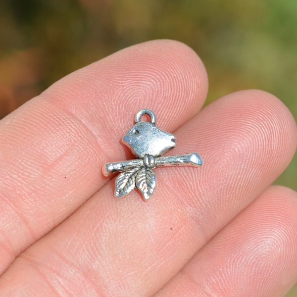 10  Little Bird Sitting on a Branch Silver Tone Charms SC3019